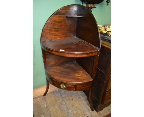A Georgian bow fronted Mahogany Corner Washstand with large galleried back and upper small corner shelf, over the two lower s