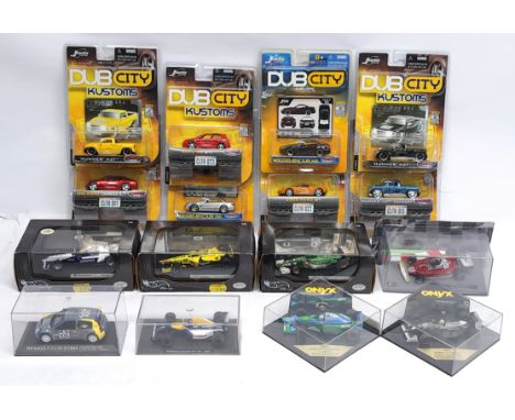 Modern Diecast group to include (1) Hot Wheels 50205 Eddie Irvine; (2) Hot Wheels 50208 Jarno Trulli; (3) Onyx 205A Benetton 