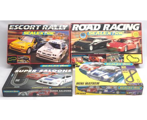 Scalextric, a group of Slot Racing Sets to include C.672 Escort Rally; C.770 Road Racing; C.1016 Super Saloons; Mini Mayhem.&