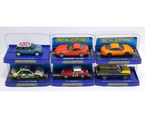 Scalextric, a group of 1:32nd scale Slot Cars to include (1) C2871 Porsche 997; (2) C2877 Range Rover - HM Coastguard (missin
