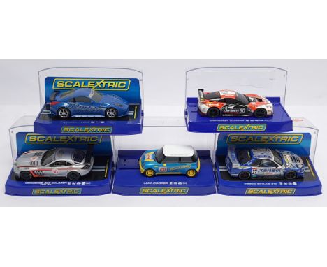 Scalextric, a group of 1:32nd scale Racing (and related) Slot Cars to include (1) C2879 Nissan 350Z Drift Greddy; (2) C2910 N