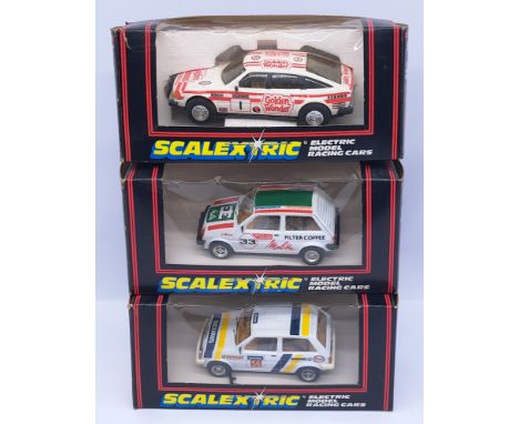 Scalextric, a group of 1:32nd scale Racing Slot Cars to include (1) C.330 Golden Wonder Rover; (2) C.331 Melita Metro; (3) C.