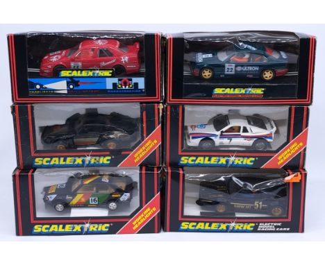 Scalextric, a group of 1:32nd scale Racing Slot Cars to include (1) C.144 Martini Lancia; (2) C.197 Alfa Romeo 155; (3) C.251
