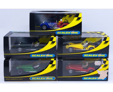 Scalextric, a group of 1:32nd scale Racing Slot Cars to include (1) C2201 Caterham 7; (2) C2230 Lotus No. 7 Green; (3) C2589 