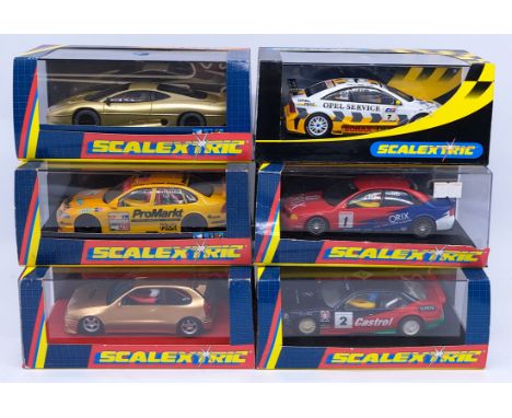 Scalextric, a group of 1:32nd scale Racing Slot Cars to include (1) C2000 Opel Vectra Promarkt; (2) C2130 Toyota Corolla; (3)