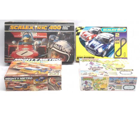 Scalextric, a mixed group of Slot Racing Sets to include C.400 Turtle Power; C.589 Scalextric 400 (NO power supply included);