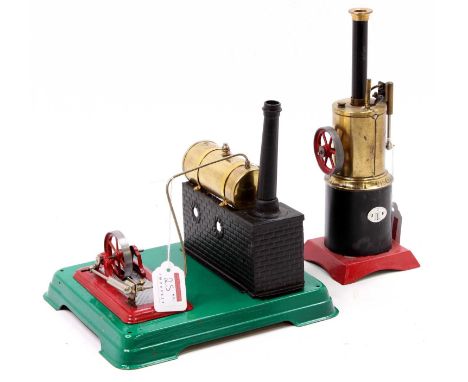 A miniature restored steam engine group to include a spirit-fired horizontal steam plant powering a single oscillating cylind