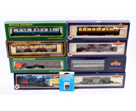 A collection of various boxed 00 gauge coaches and rolling stock by Bachmann, Mainline and Replica Railways, mixed examples t