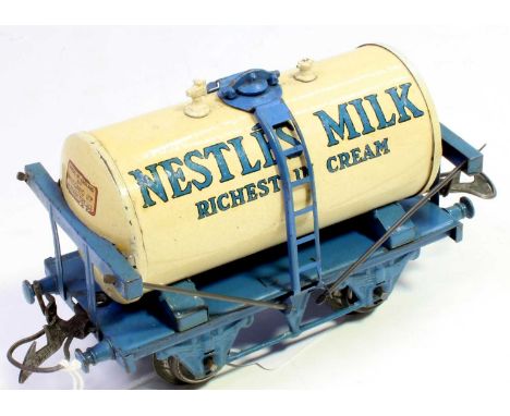 Hornby 1936-9 'Nestles' milk tank wagon on light blue base, would benefit from clearning (G)