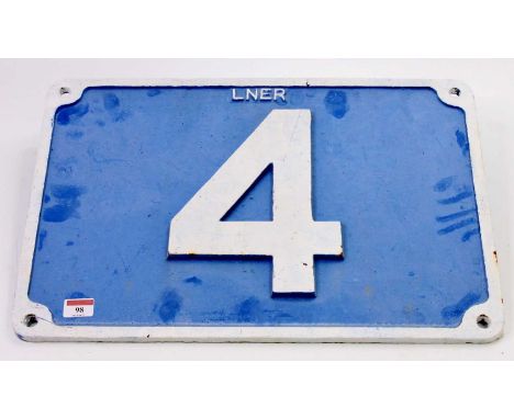An original cast iron and later overpainted LNER No. 4 rectangular sign with four fixing holes, overpainted white over light 