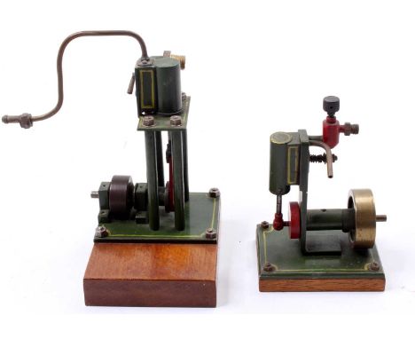 A pair of stationary steam engines comprising of vertical single cylinder engine with slip eccentric and take-off point, toge