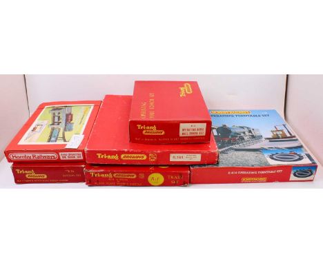 A collection of Triang Railways and Hornby boxed gift sets and train sets to include a Triang R81 station set, a Hornby Railw
