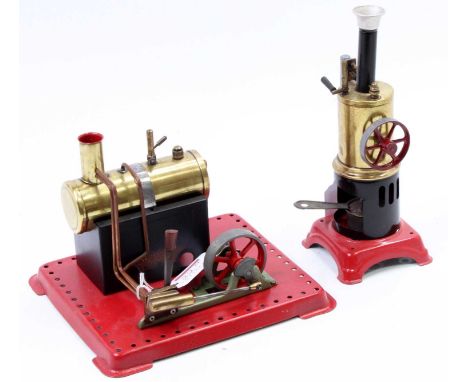 A Mamod and German steam engine group to include a restored Mamod SE1 steam engine comprising of horizontal boiler, powering 