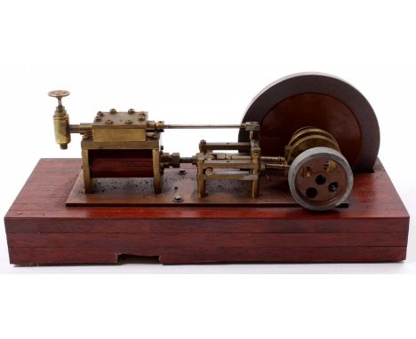 A scratch built to freelance design model of a stationary horizontal steam engine, comprising of single horizontal wooden cla