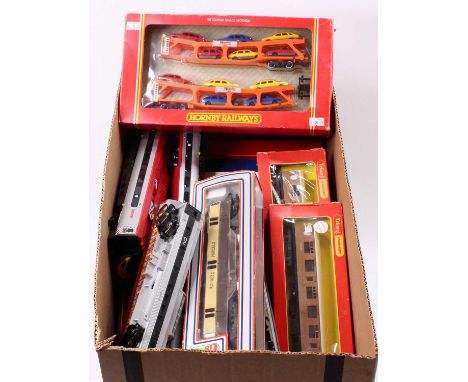Approximately 30 boxed and loose passenger stock, rolling stock and locomotives to include a Lima Railways Express Parcels No