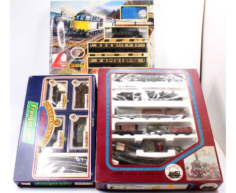 3 boxed OO gauge train sets comprising a Bachmann No. 30-200 Freight Set, Lima No. 105106TW GWR Passenger set, and a Dapol 2-