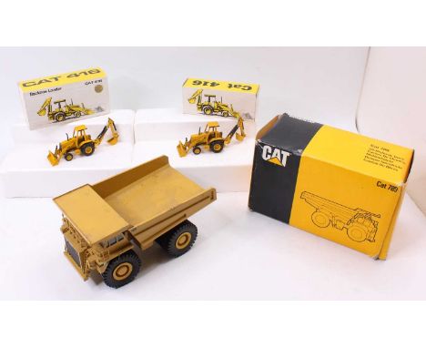 NZG and Conrad 1/50th scale boxed group of 3 comprising 2x NZG No. 285 Caterpillar 416 Backhoe Loader - one of these has been