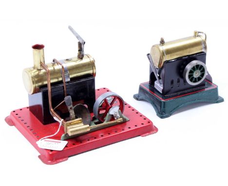 Two various recently restored stationary steam plants comprising of a Mamod SE1 spirit fired steam engine with a horizontal b
