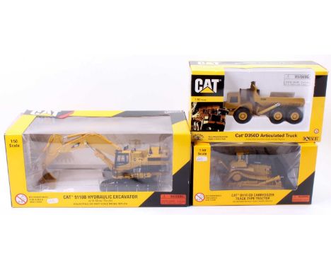 Norscott 1/50th scale construction models, 3 boxed examples to include No. 55700 CAT D350D Articulated Truck, No. 55098 CAT 5