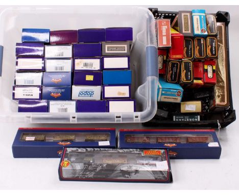 A collection of approx 50 various boxed and loose 00 gauge items of rolling stock and triple wagon packs to include Bachmann,