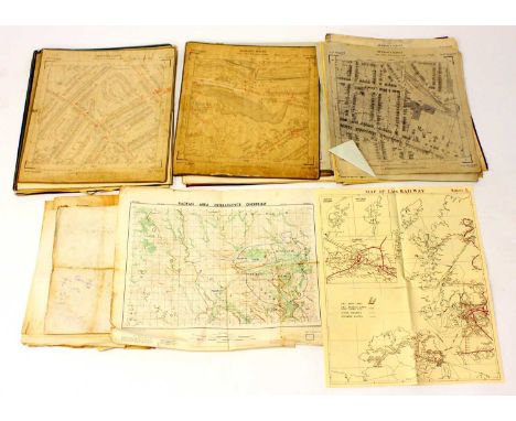 A large collection of various National Grid related Ordnance Survey maps, some on canvas, others on paper, a large quantity i