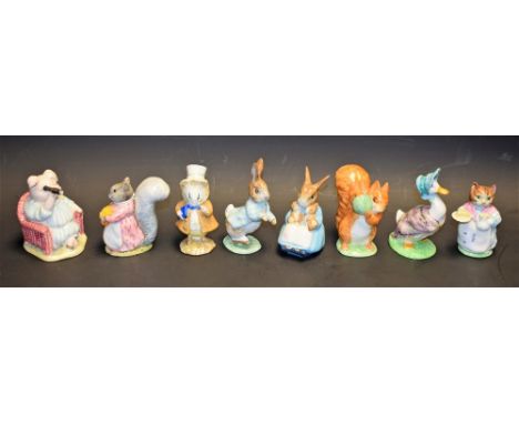 Beswick Beatrix Potter ceramic models, including Little Pig Robinson Spying, Goody Tiptoes, Squirrel Nutkin, Amiable Guinea-P