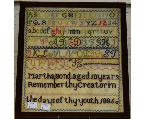 A Victorian woolwork alphabet sampler, Martha Bond aged 10 years, 1886