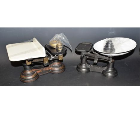 A set of iron scales, by Parnall &amp; Sons with weights ensuite; another, similar (2)