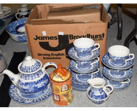 A Broadhurst Ironstone Silver Jubilee blue and white tea service, featuring Royal palaces, comprising tea pot, cups, saucers,