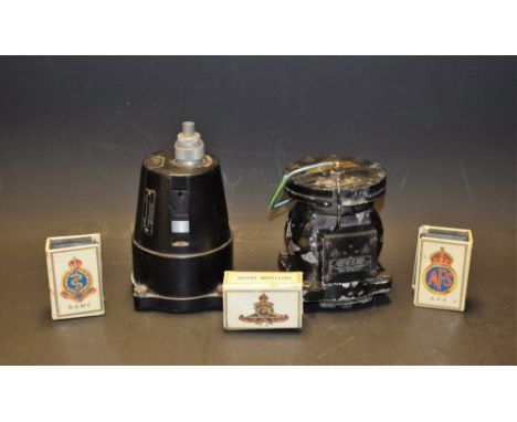 A US ARMY compass Type B-16;  a Kollsman tachometer; three matchbox covers Royal Army Medical Corps, Royal Artillery, Auxilia