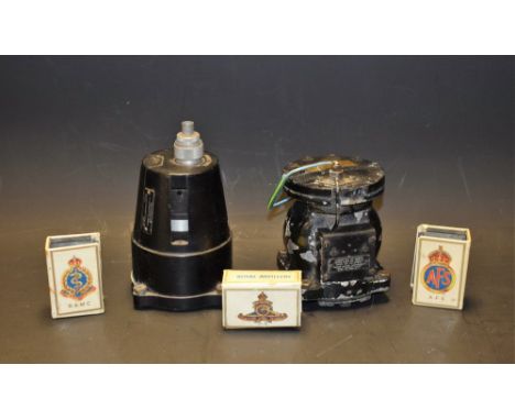 A US ARMY compass Type B-16;  a Kollsman tachometer; three matchbox covers Royal Army Medical Corps, Royal Artillery, Auxilia