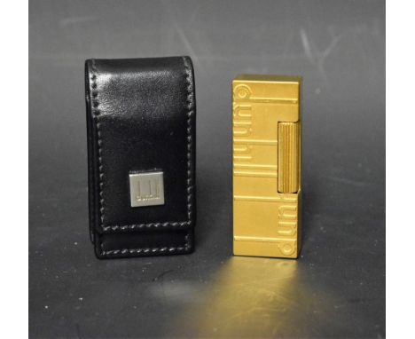 A Dunhill lighter, in leather case, no.29439