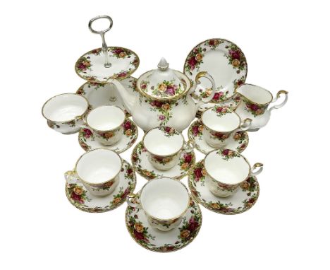 Royal Albert Country Roses pattern tea service for six, comprising Teapot, open sucurer, milk jug, cups and saucers, dessert 
