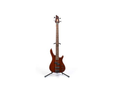 A Stagg four-string bass guitar, with maple neck, rosewood fretboard, contoured hardwood body.