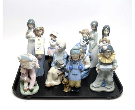 A collection of Nao figure of children, of various sizes and designs, including examples modelled playing with puppies, dolls