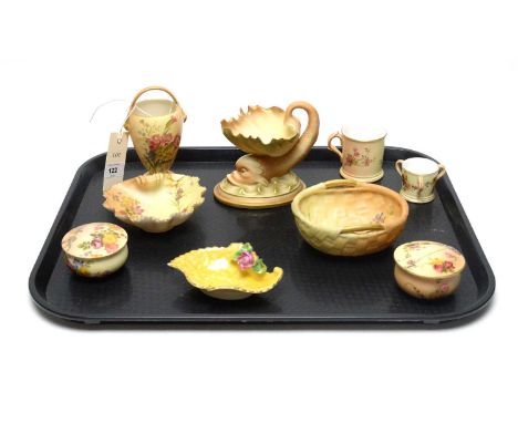 A collection of Royal Worcester blush ivory ceramics, including: Dolphin pedestal pin dish, pattern 95, 11.5cms high; basket 