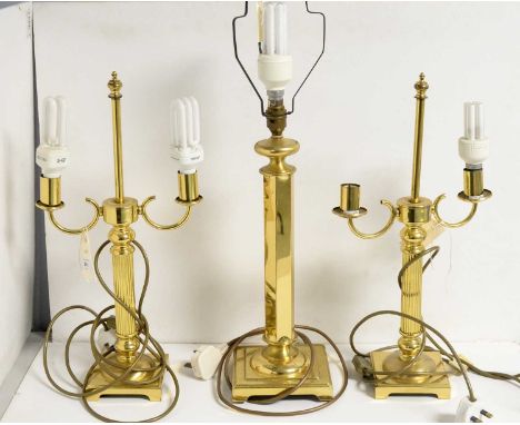 A contemporary brass table lamp, by Franklite, with hexagonal column support and square base, 62cms high; together with a pai