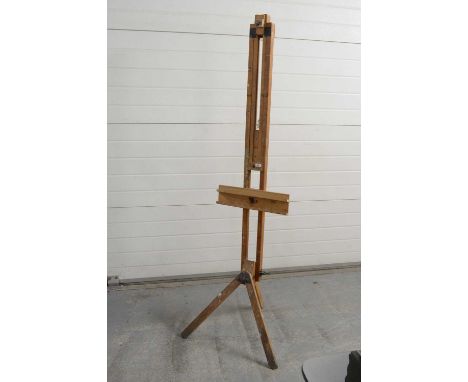 An artists picture easel, adjustable, with tripod supports.