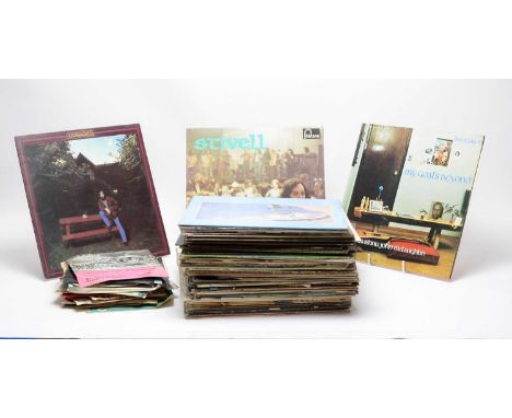 A collection of mixed LPs and 7" singles, artists to include: Bob Dylan; Jeff Beck; Fleetwood Mac; Jefferson Starship; Kathry