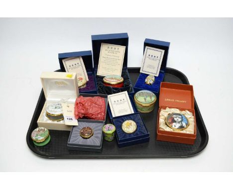 A collection of Halcyon Days Enamels pill boxes, including: Halcyon Days Enamels ‘Aquascutum’ pill box, in box; Halcyon Days 