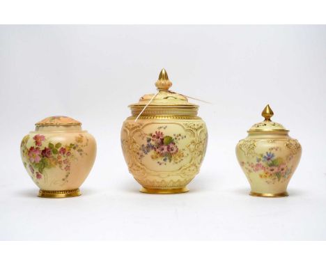 A Royal Worcester blush ivory vase and cover, handpainted with flowers, pattern 171,  17cms high; together with a similar sma