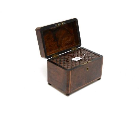 An early 19th Century walnut and boxwood banded tea caddy, with domed top, raised on four bun feet, 17.5cms wide.