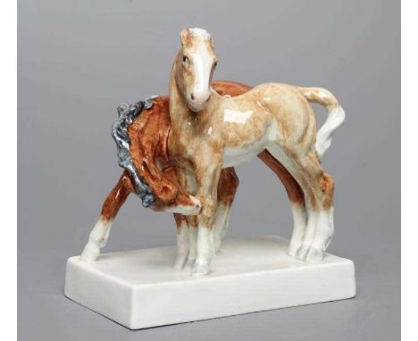 "FOALS" - A ROYAL WORCESTER CHINA GROUP, 1954, modelled by Doris Lindner, on an oblong base, printed mark in green, model num
