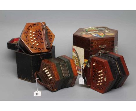 A LACHENAL &amp; CO., LONDON CONCERTINA, Serial No. 84297, with mahogany ends and twenty one bone buttons, maker’s paper labe