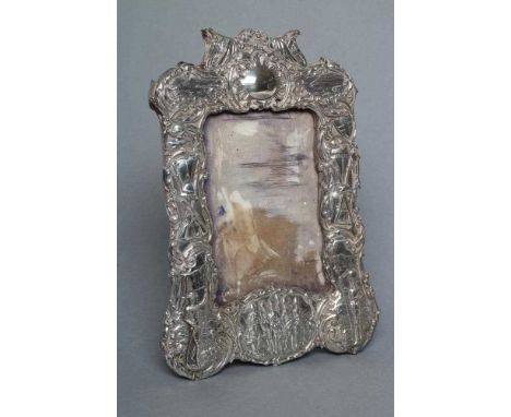 OF BOER WAR INTEREST - a late Victorian easel back photograph frame, maker Deakin &amp; Deakin, Chester 1900, of shaped verti