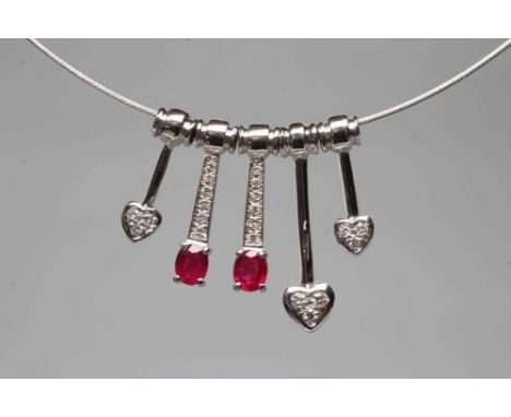 A RUBY AND DIAMOND CHOKER, stamped 750, the fine white wire choker with five "pendants", two claw set with oval facet cut rub
