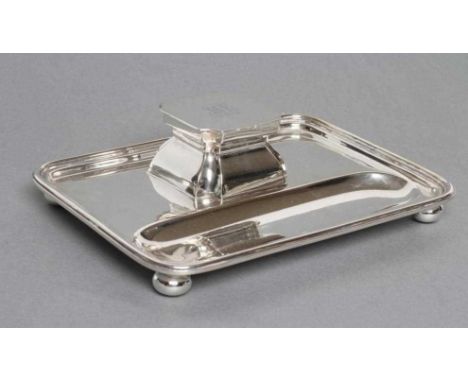 A SILVER DESK STANDISH, maker Samuel Walton Smith &amp; Co., London 1916, of rounded oblong form raised upon four bun feet, c
