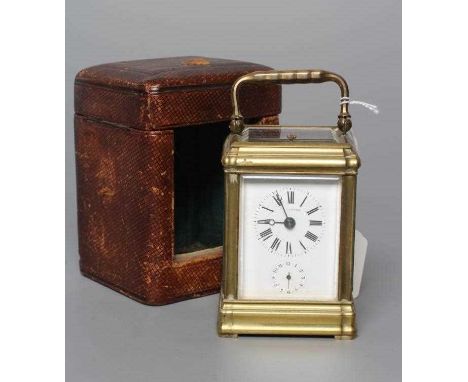 A FRENCH REPEATING CARRIAGE CLOCK, c.1900, the twin barrel movement with platform escapement striking on a gong, the white en