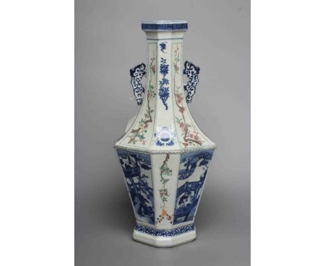 A CHINESE PORCELAIN VASE of swept octagonal form with two scrolling handles, painted in underglaze blue with panels of childr