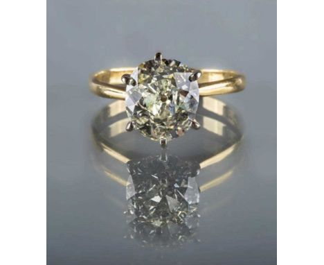 A SOLITAIRE DIAMOND RING, the Victorian cut stone of approximately 3.17cts, claw set to a plain 18ct gold shank, sponsor's ma